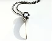 Mens designer sterling silver necklace that takes the form of an ibis skull